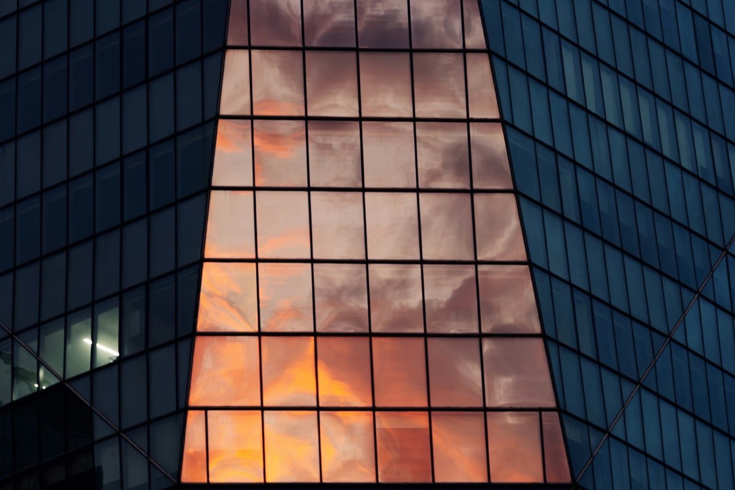 Modern financial tower at golden hour representing AML compliance for Canadian MSBs